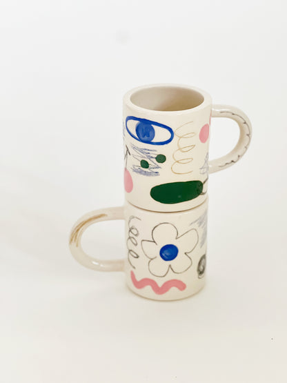 Experience endless fun and creativity with our Large Doodle Story Handmade ceramic Mug. This unique mug features a doodle drawing story design that will bring out your inner artist. Enjoy your favorite drink while unleashing your imagination. Elevate your drinking experience today.