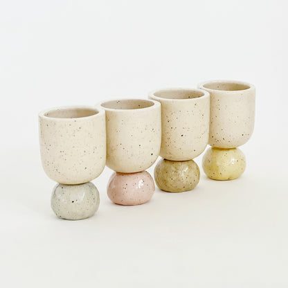 The Pastel Handmade Ceramic Cup is a charming addition to your drinkware collection. With its cute design and pastel color, this wine cup adds a touch of whimsy to your drinking experience. Made from high-quality materials, it is not only visually appealing but also durable. Elevate your wine-drinking time with this delightful cup.