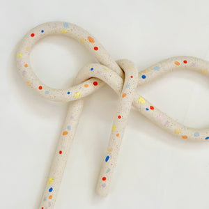 Clay Object 91 - Sprinkles on White Speckles Bow