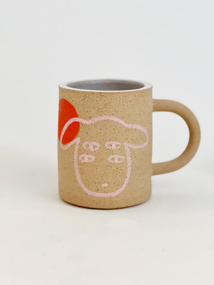 Introducing our Large Little Four Eyes Handmade Ceramic Mug, featuring our signature design inspired by our adorable and beloved pet, Bowl. This cute and unique mug is perfect for pet lovers. Handcrafted with care, it's the perfect addition to your morning routine. Brighten up your day with every sip!