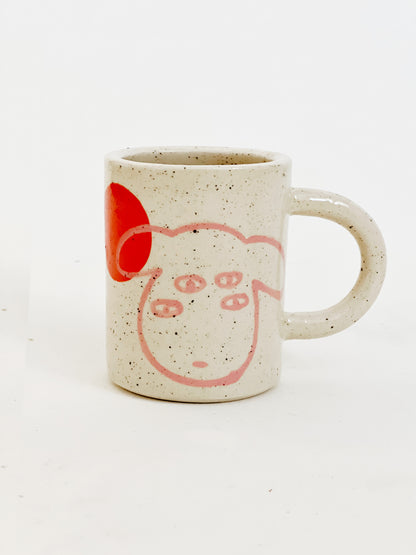 Introducing our Large Little Four Eyes Handmade Ceramic Mug, featuring our signature design inspired by our adorable and beloved pet, Bowl. This cute and unique mug is perfect for pet lovers. Handcrafted with care, it's the perfect addition to your morning routine. Brighten up your day with every sip!