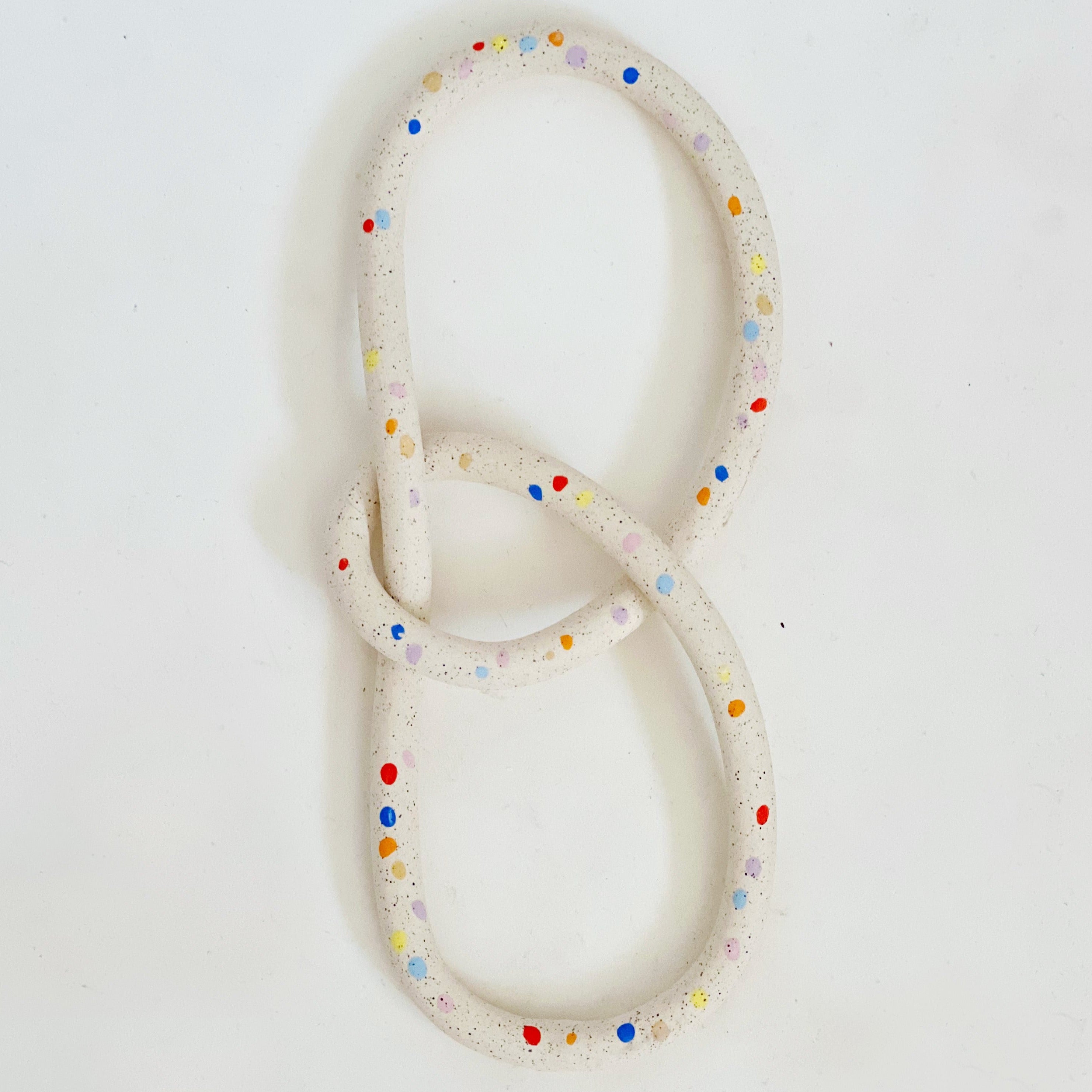 Sprinkles on White Speckled Handmade Loop Wall Hanging – O-M Ceramic