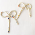 handmade, los angeles, ceramic, clay object, wall  hanging, art, pottery, clay object, rope, sprinkles, dots, bow