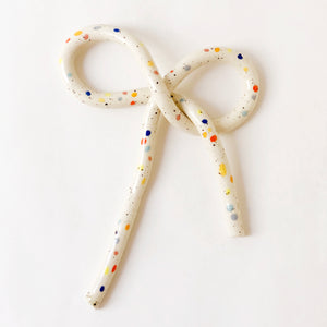 handmade, los angeles, ceramic, clay object, wall  hanging, art, pottery, clay object, rope, sprinkles, dots, bow